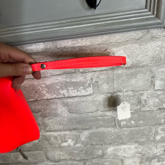 NWT Fluorescent Wristlet (Flamingo colored) - Picture 2 of 4